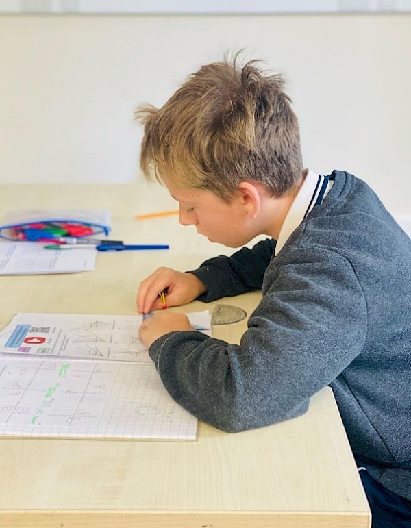 Smiling student at the computer